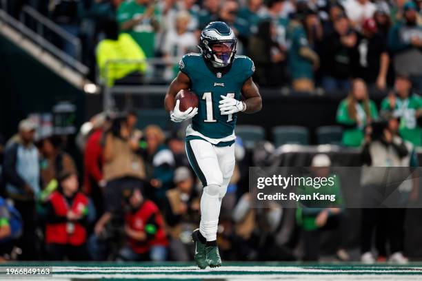 Kenneth Gainwell of the Philadelphia Eagles runs with the ball after scoring a touchdown during an NFL football game against the Dallas Cowboys at...