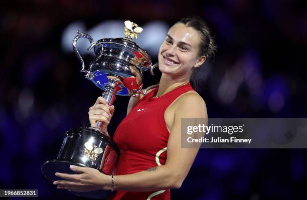 Aryna Sabalenka poses with the Daphne Akhurst Memorial Cup after the the Women's Singles Final match between Qinwen Zheng of China and Aryna...