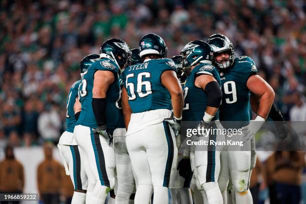 The Philadelphia Eagles huddle on offense during an NFL football game against the Dallas Cowboys at Lincoln Financial Field on November 5, 2023 in...