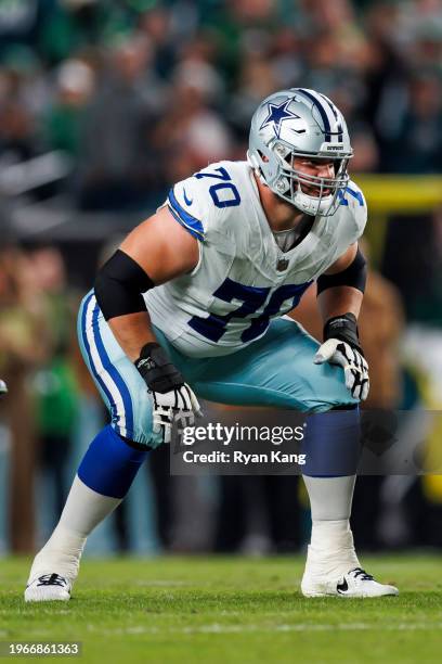 Zack Martin of the Dallas Cowboys gets set to block during an NFL football game against the Philadelphia Eagles at Lincoln Financial Field on...