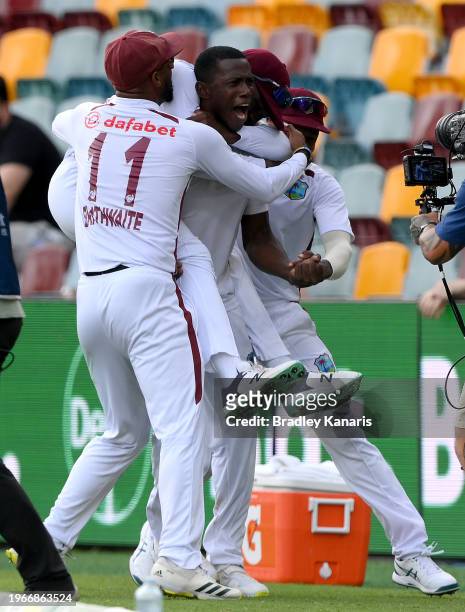 Shamar Joseph of the West Indies celebrates victory after taking the wicket of Josh Hazlewood of Australia during day four of the Second Test match...