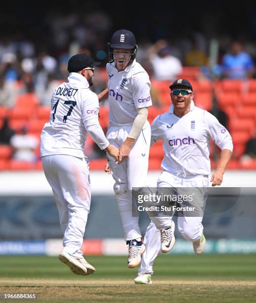 England fielder Ollie Pope celebrates with Ben Duckett after he caught Shubman Gill during day four of the 1st Test Match between India and England...