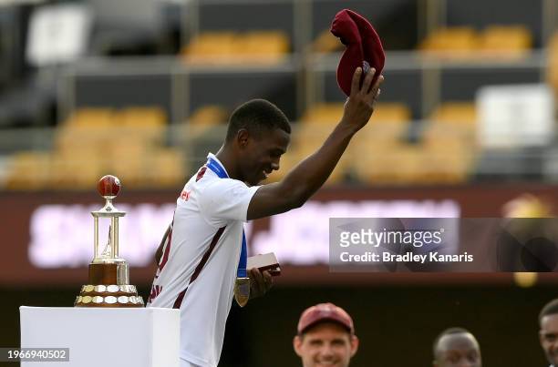 Shamar Joseph of the West Indies takes a bow as he celebrates winning the man of the match and man of the series awards during day four of the Second...