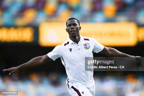 Shamar Joseph of West Indies celebrates dismissing Josh Hazlewood of Australia and winning the match for West Indies during day four of the Second...