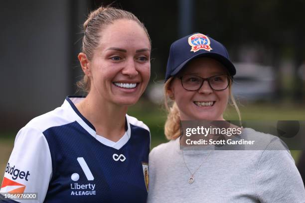 Kyah Simon of the Mariners with a Jets fan post game during the A-League Women round 14 match between Newcastle Jets and Central Coast Mariners at...