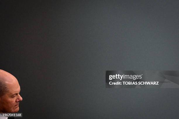 German Chancellor Olaf Scholz attends a plenary session in the Bundestag, Germany's lower house of parliament debating the governments budget, in...