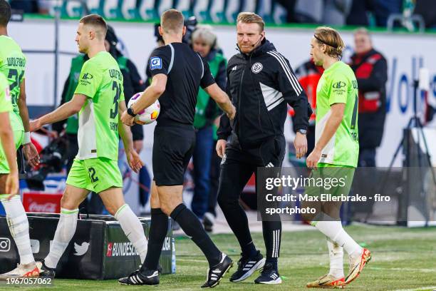 The new 4th official Tobias Krull of MTV Gifhorn at the sideline during the Bundesliga match between VfL Wolfsburg and 1. FC Köln at Volkswagen Arena...