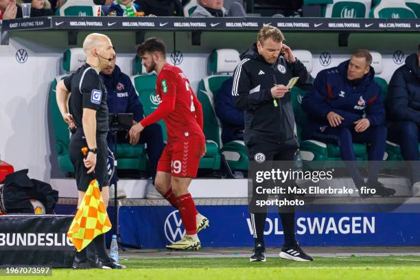 The new 4th official Tobias Krull of MTV Gifhorn at the sideline during the Bundesliga match between VfL Wolfsburg and 1. FC Köln at Volkswagen Arena...