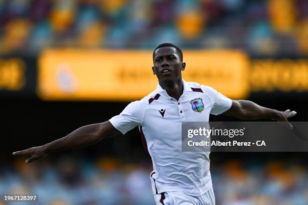 Shamar Joseph of West Indies celebrates dismissing Josh Hazlewood of Australia and winning the match for West Indies during day four of the Second...