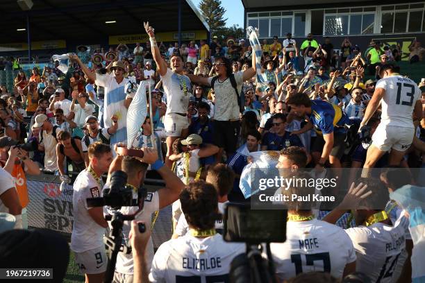 Rodrigo Isgro of Argentina and team mates celebrates with supporters after winning the 2024 Perth SVNS men's Cup Final match between Argentina and...