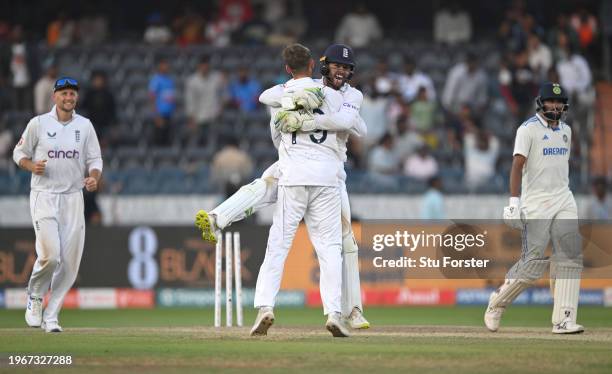 England wicketkeeper Ben Foakes celebrates with Tom Hartley after taking the final wicket during day four of the 1st Test Match between India and...