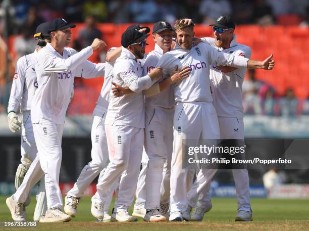 Joe Root celebrates with team-mates including Ben Duckett, Ollie Pope and Ben Stokes after dismissing KL Rahul during day four of the 1st Test Match...