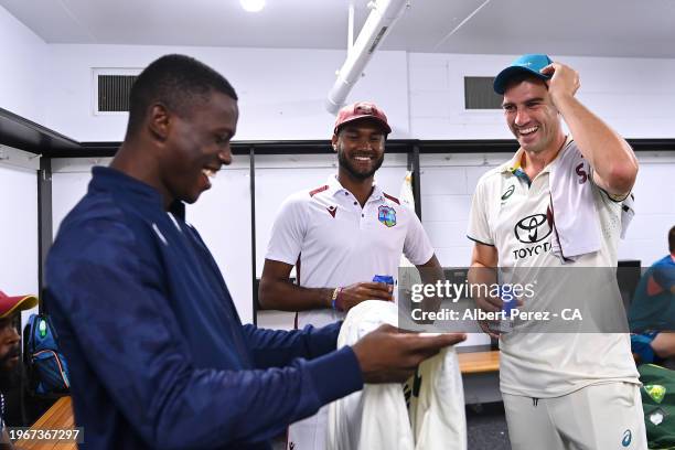 Shamar Joseph of West Indies reacts after he was gifted a shift by Pat Cummins of Australia during day four of the Second Test match in the series...