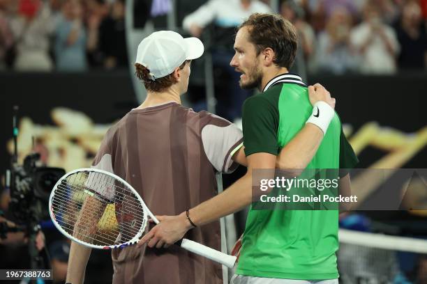 Daniil Medvedev and Jannik Sinner of Italy embrace after their Men's Singles Final match during the 2024 Australian Open at Melbourne Park on January...