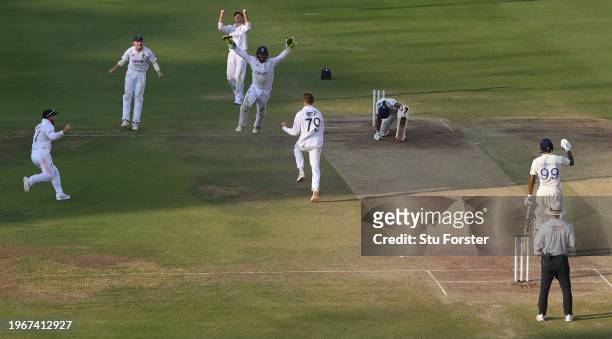 England bowler Tom Hartley celebrates with team mates after taking the wicket of India batsman Srikar Bharat during day four of the 1st Test Match...