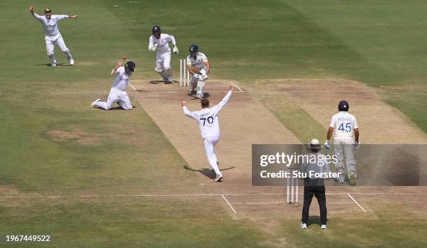 England fielder Ollie Pope takes the catch off the bowling of Tom Hartley to dismiss Shubman Gill during day four of the 1st Test Match between India...