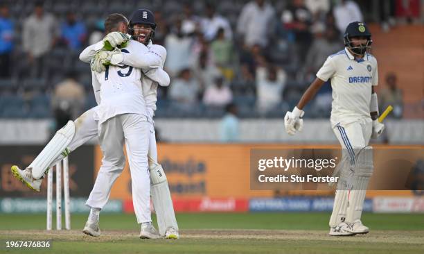 England wicketkeeper Ben Foakes celebrates with Tom Hartley after taking the final wicket during day four of the 1st Test Match between India and...