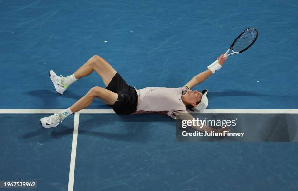 Jannik Sinner of Italy celebrates winning championship point in their Men's Singles Final match against Daniil Medvedev during the 2024 Australian...