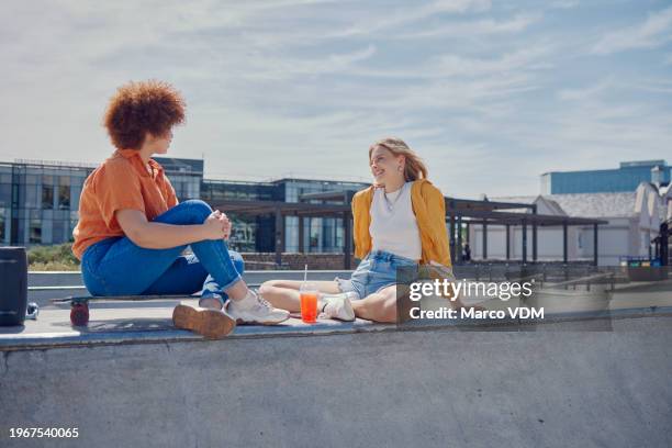 relax, conversation and women friends at a skate person for chilling, speaking or weekend hangout together. trust, communication and gen z people outdoor for travel, bonding or sharing gossip outside - skateboard park stock pictures, royalty-free photos & images