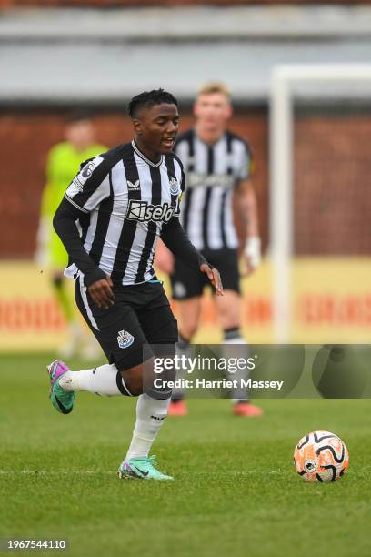 Michael Ndiweni of Newcastle United runs with the ball during the Premier League 2 match between Blackburn Rovers U21 and Newcastle United U21 at...