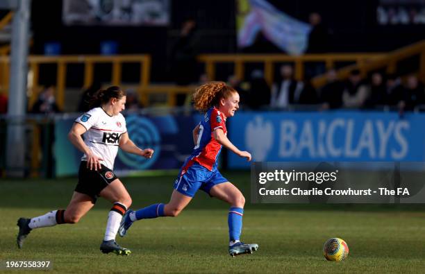 Annabel Blanchard of Crystal Palace runs with the ball whilst under pressure from Melisa Fils of Charlton during the Barclays FA Women's Championship...