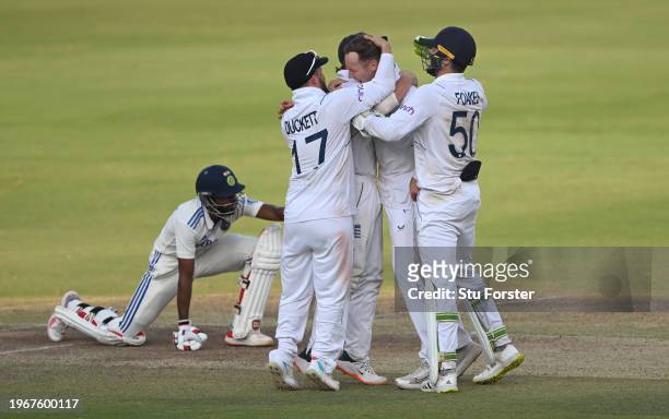 England bowler Tom Hartley celebrates with team mates after taking the wicket of India batsman Srikar Bharat during day four of the 1st Test Match...