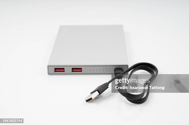 power bank for charging mobile devices. white smart phone charger with power bank. battery bank. external battery for mobile devices. - realistic illustration stock pictures, royalty-free photos & images