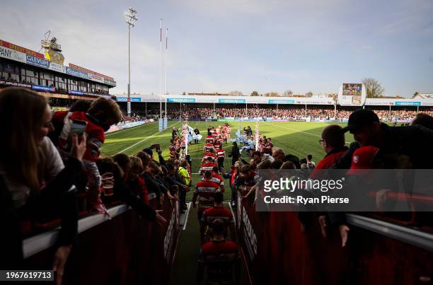 Gloucester Rugby run onto the pitch during the Gallagher Premiership Rugby match between Gloucester Rugby and Sale Sharks at Kingsholm Stadium on...