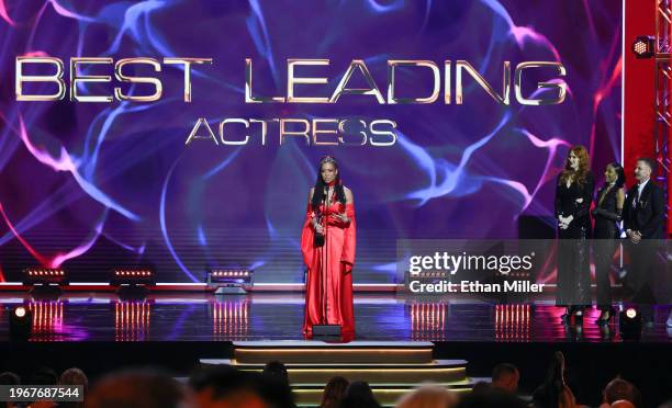 Kira Noir accepts the Best Leading Actress award as presenters Maitland Ward, Olivia Jay and Scott Nails look on during the 2024 Adult Video News...