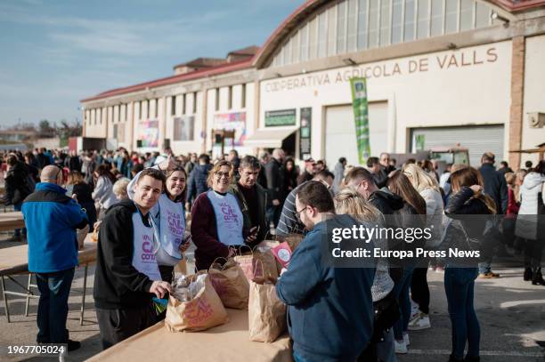 People eat calçots, on January 28 in Valls, Tarragona, Catalonia, Spain. The last Sunday of January is celebrated in Valls the Great Feast of the...