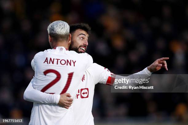 Bruno Fernandes of Manchester United celebrates with Antony of Manchester United after scoring his team's first goal during the Emirates FA Cup...