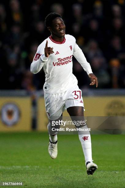 Kobbie Mainoo of Manchester United celebrates scoring his team's second goal during the Emirates FA Cup Fourth Round match between Newport County and...