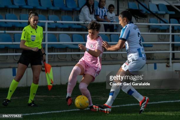 Lucia Pardo of Madrid CFF vies with Manuela Vanegas of Real Sociedad during the Primera Division Femenina match between Real Sociedad and Madrid CFF...