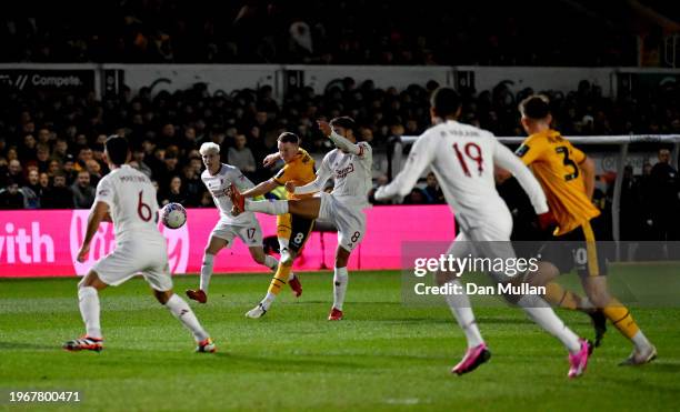 Bryn Morris of Newport County scores his team's first goal during the Emirates FA Cup Fourth Round match between Newport County and Manchester United...