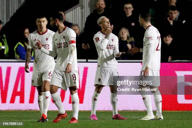 Antony of Manchester United celebrates scoring his team's third goal during the Emirates FA Cup Fourth Round match between Newport County and...