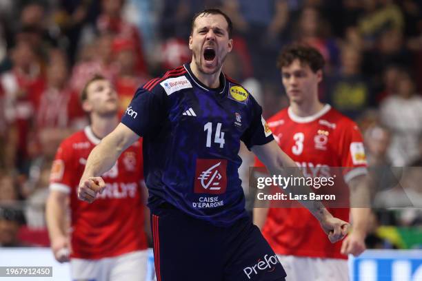 Kentin Mahe of France celebrates a goal during the Men's EHF Euro 2024 final match between Denmark and France at Lanxess Arena on January 28, 2024 in...