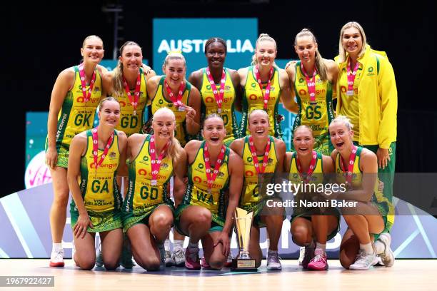 Australia celebrate during the trophy presentation after their victory during the Vitality Netball Nations Cup Final match between Australia Origin...