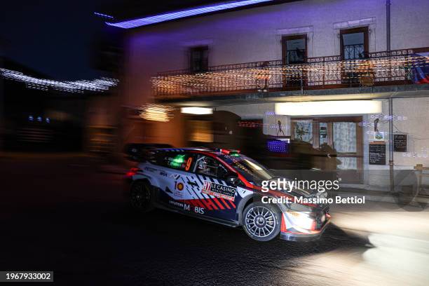Andreas Mikkelsen of Norway and Torstein Eriksen of Norway compete driving the Hyundai Shell Mobis WRT Hyundai i20 N Rally1 Hybrid during Day Four of...