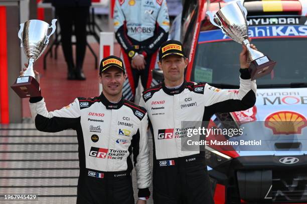 Sebastien Ogier of France and Vincent Landais of France in the final podium during Day Four of the FIA World Rally Championship Monte-Carlo on...