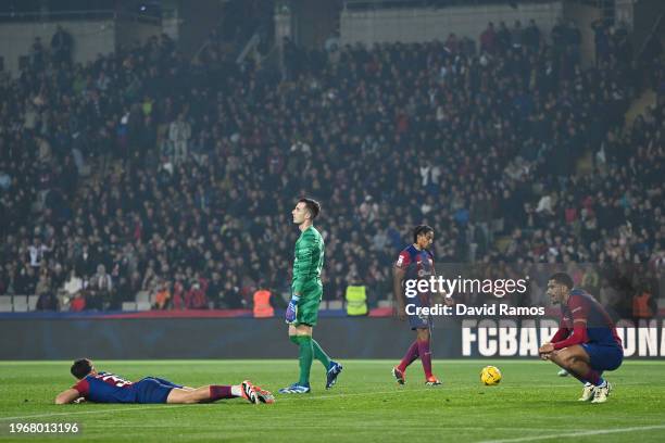 Pau Cubarsi, Iñaki Peña, Jules Kounde and Ronald Araujo of FC Barcelona show their dejection during the LaLiga EA Sports match between FC Barcelona...