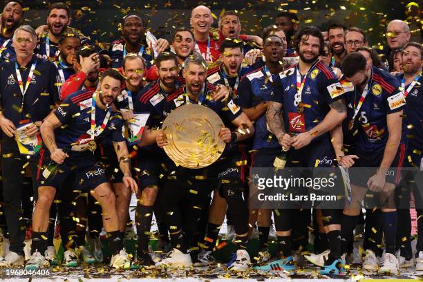 Luka Karabatic of France lifts the trophy after the team's victory in the Men's EHF Euro 2024 final match between Denmark and France at Lanxess Arena...