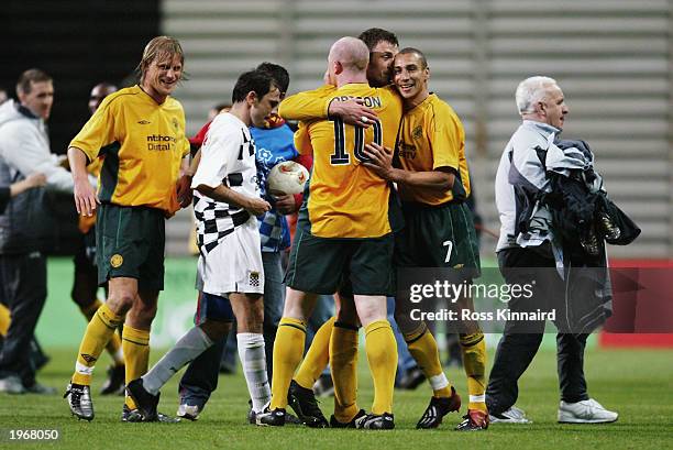 John Hartson, Chris Sutton and Henrik Larsson of Celtic celebrate victory after the the UEFA Cup Semi-Final between Boavista FC and Glasgow Celtic...