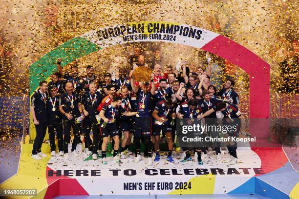 Luka Karabatic of France lifts the trophy after the team's victory in the Men's EHF Euro 2024 final match between Denmark and France at Lanxess Arena...