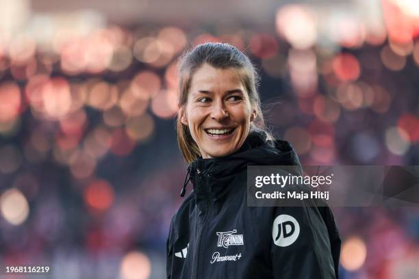 Marie-Louise Eta, Interim Head Coach of 1.FC Union Berlin, looks on during the warm up prior to the Bundesliga match between 1. FC Union Berlin and...