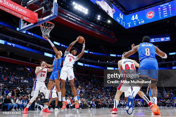 Ausar Thompson of the Detroit Pistons grabs a rebound in the second quarter of a game against the Oklahoma City Thunder at Little Caesars Arena on...