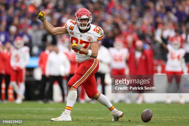 Travis Kelce of the Kansas City Chiefs reacts after a catch against the Baltimore Ravens during the second quarter in the AFC Championship Game at...