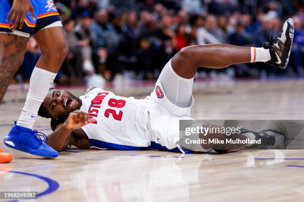 Isaiah Stewart of the Detroit Pistons reacts after falling on his arm in the fourth quarter of a game against the Oklahoma City Thunder at Little...