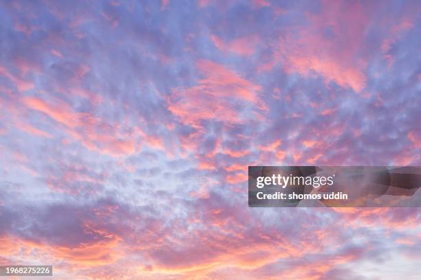 cloudscape at sunrise - makreel stockfoto's en -beelden