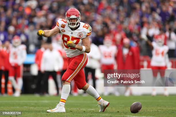 Travis Kelce of the Kansas City Chiefs reacts after a catch against the Baltimore Ravens during the second quarter in the AFC Championship Game at...
