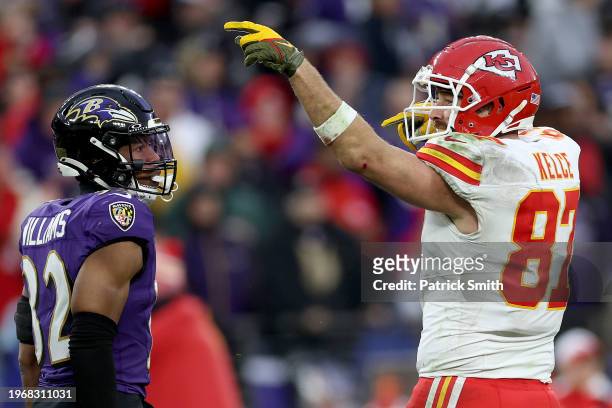 Travis Kelce of the Kansas City Chiefs reacts after a first down against the Baltimore Ravens during the second quarter in the AFC Championship Game...